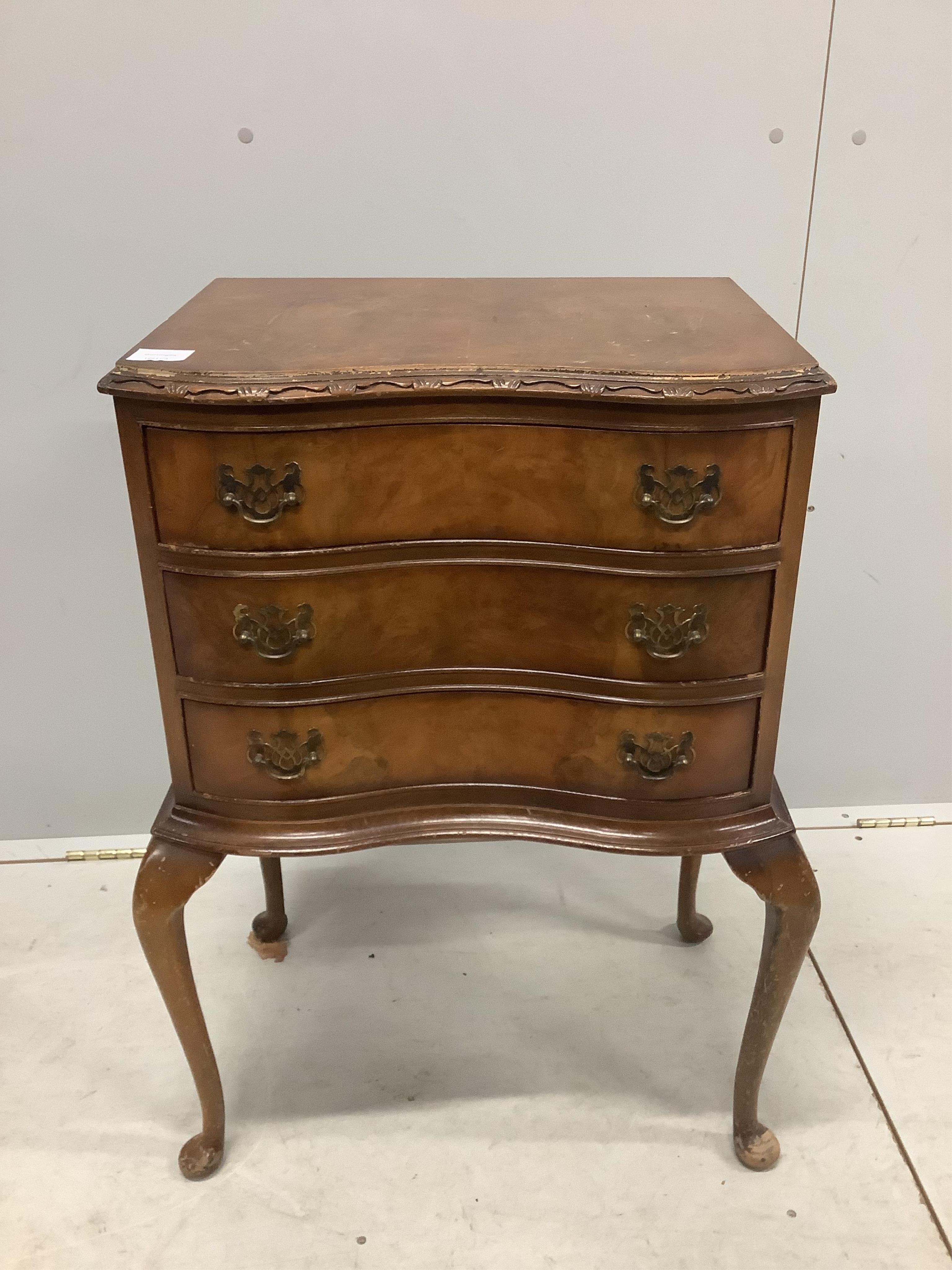 A pair of Queen Anne Revival serpentine walnut three drawer bedside chests, width 51cm, depth 35cm, height 77cm. Condition - poor to fair